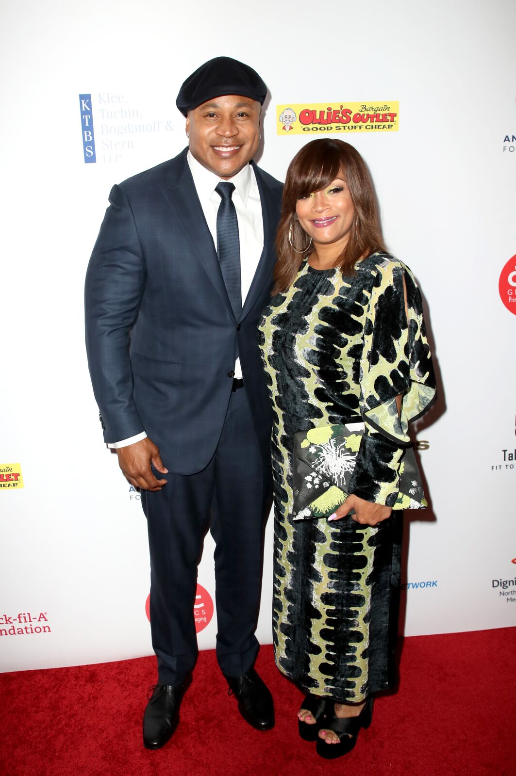 LL Cool J is all smiles in rare pic with wife, who flaunts major curves in elegant sparkling dress