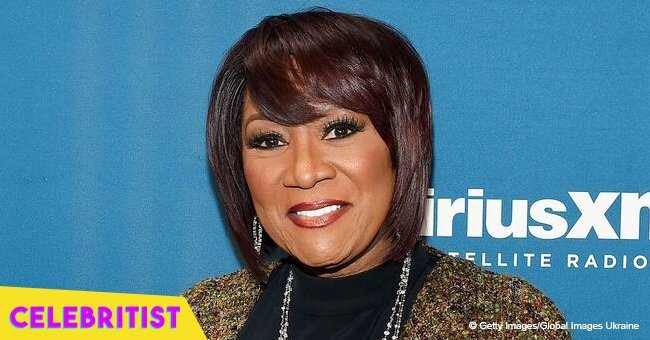 Patti LaBelle, 73, defies her age in white silk suit, displaying massive jewelry