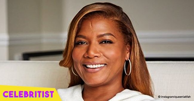 Queen Latifah makes appearance in bright yellow coat and rain boots for TV show